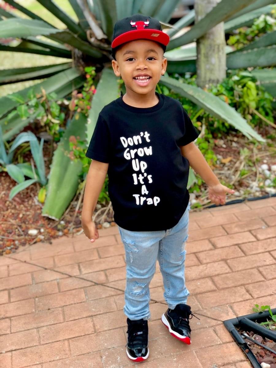 Kids Don't Grow Up: Embrace Childhood Forever with Our Playful (unisex) Tee!
